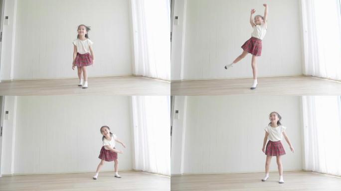 一个穿白色t恤和迷你裙的小女孩有能量。她喜欢在房间里跳舞和跳跃。