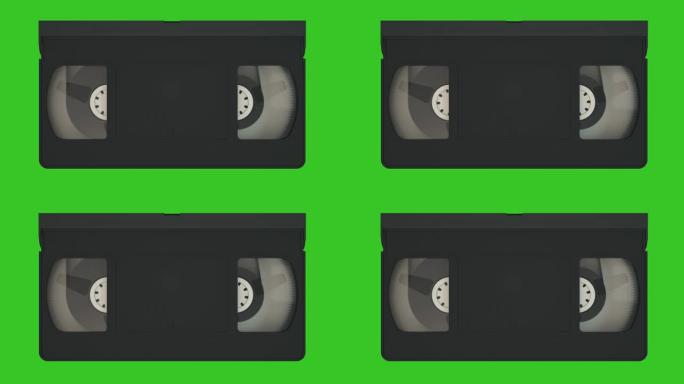 VHS盒式磁带。旧的录像带记录系统。在绿色屏幕上隔离的录像带
