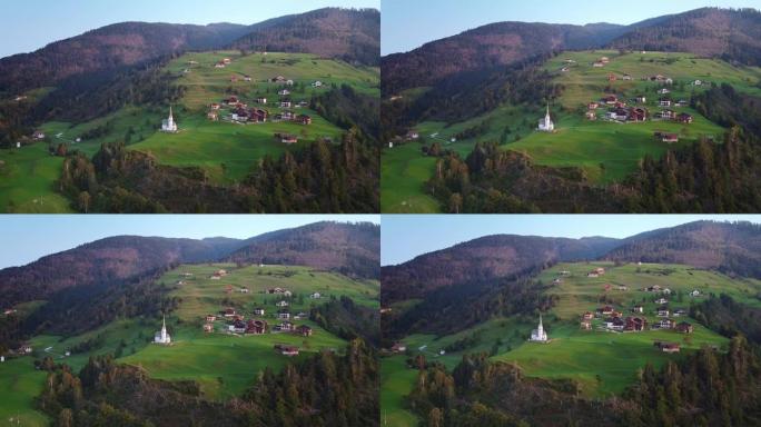 奥地利山上别墅和教堂的鸟瞰图