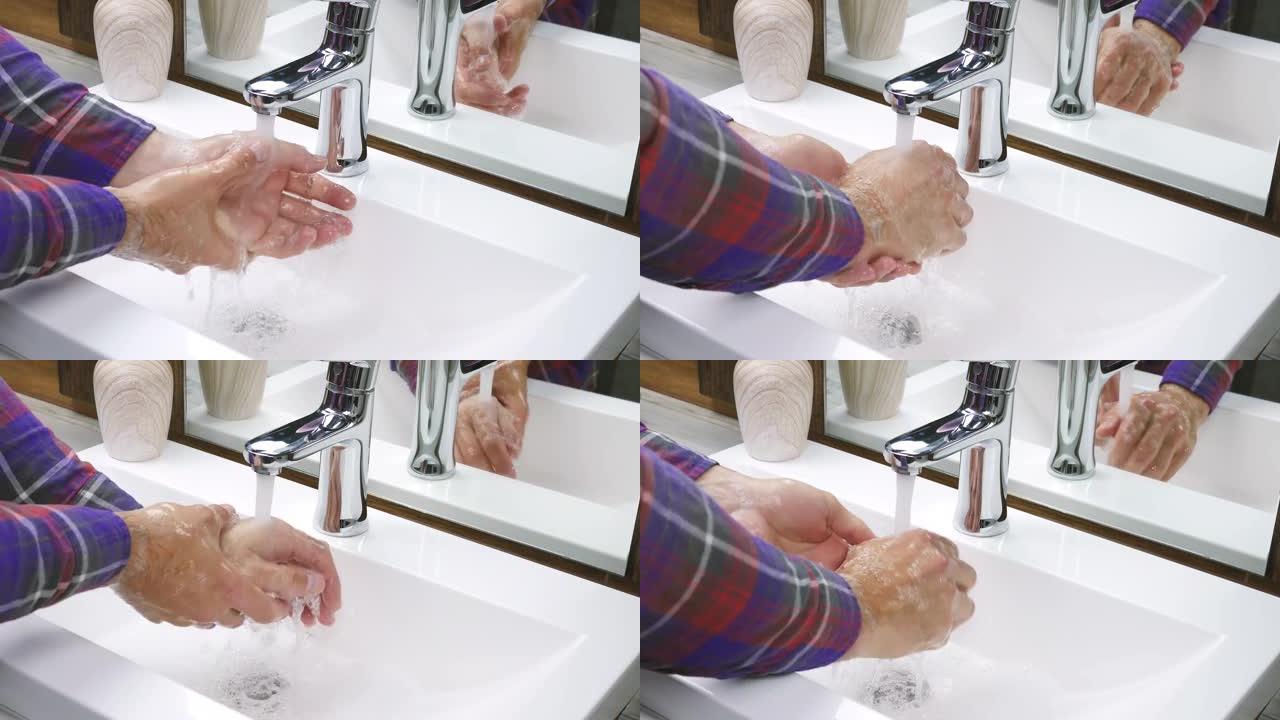 洗手的人在水槽里用流水冲洗肥皂，洗掉手上的污垢，手卫生防止冠状病毒。用清洁的手保护免受新型冠状病毒肺