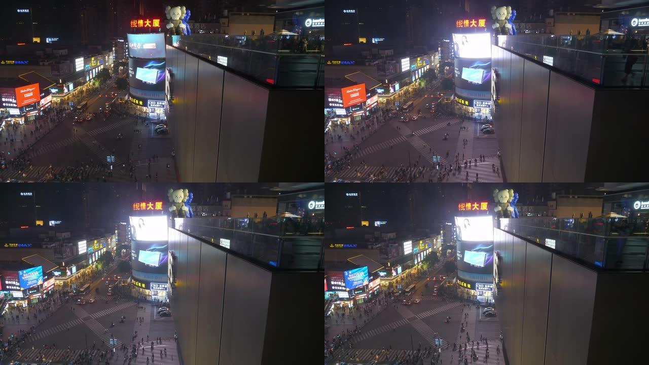 夜间长沙市市中心著名购物中心屋顶雕塑交通街人行横道全景4k中国