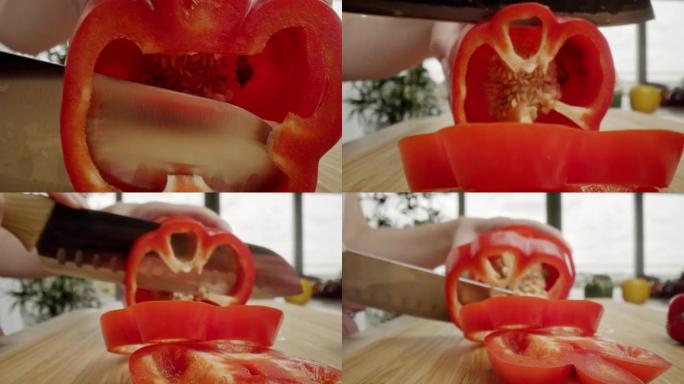 缩小切红辣椒的宏视频。用8k的红氦相机拍摄