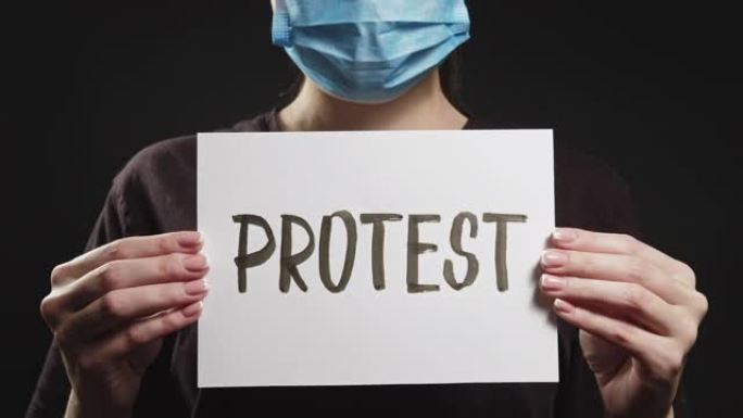 COVID-19抗议“我不能呼吸”活动人士戴的口罩标志