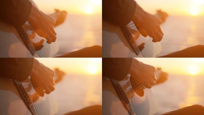 年轻人在海边弹吉他，日落
