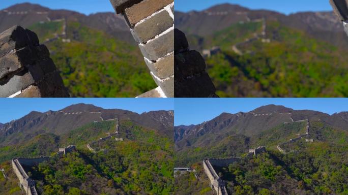 慢动作定格镜头拍摄的中国长城，在山的一侧上升在一个开始的下降。镜头穿过洞口，露出了长城