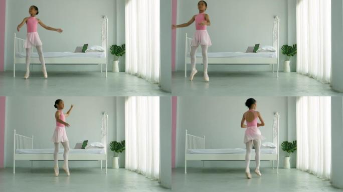 年轻的亚洲芭蕾舞演员在她的房间里练习