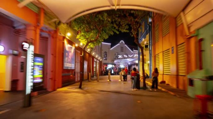 夜间照明新加坡城市著名的户外购物中心步行延时全景4k