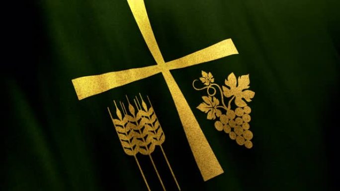 绿色布上有感恩节符号的圣十字