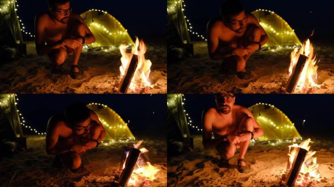 仲夏夜在海滩上燃烧的篝火