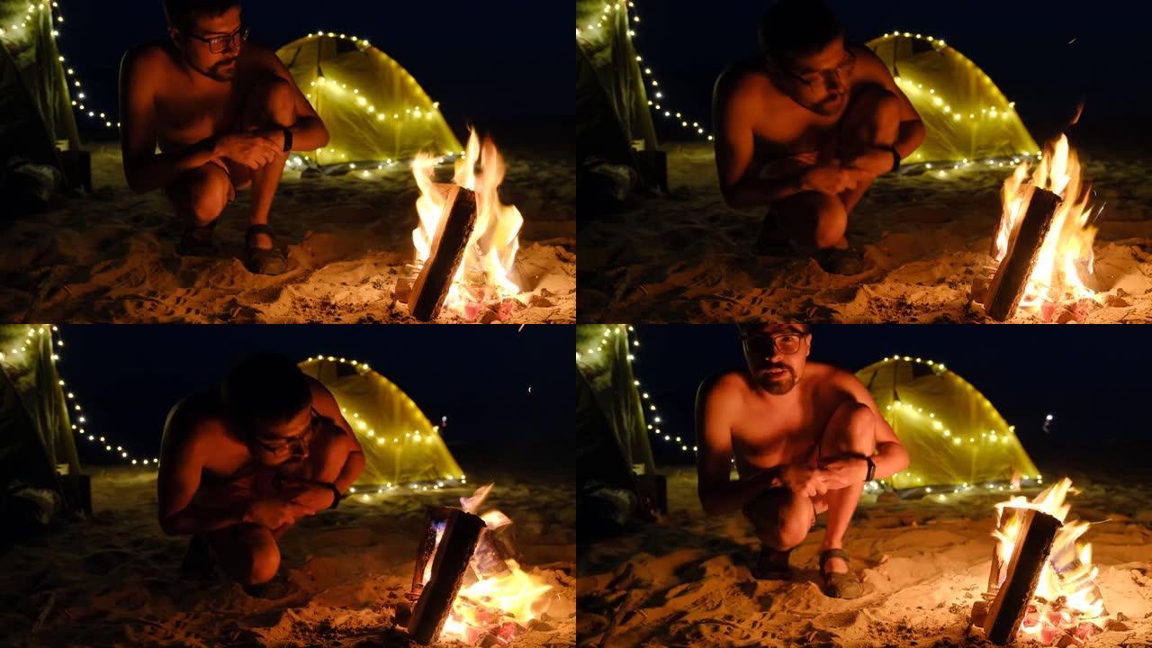 仲夏夜在海滩上燃烧的篝火
