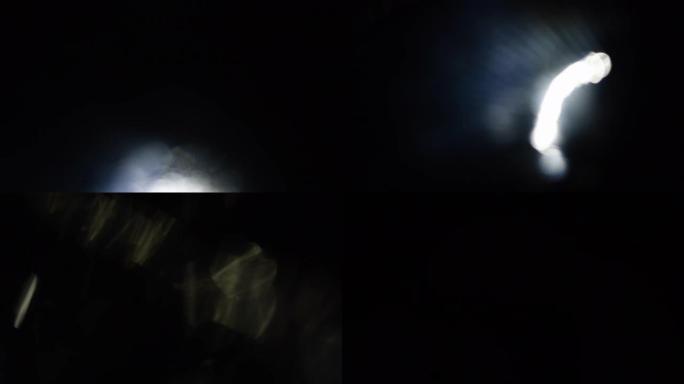 光线泄漏的镜头。抽象的Bokeh白光移动的慢动作长镜头。4k