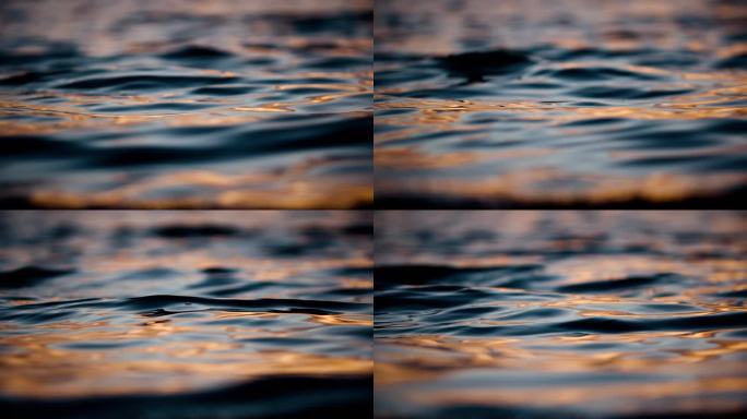 金色水面湖面夕阳下的水面波浪波光
