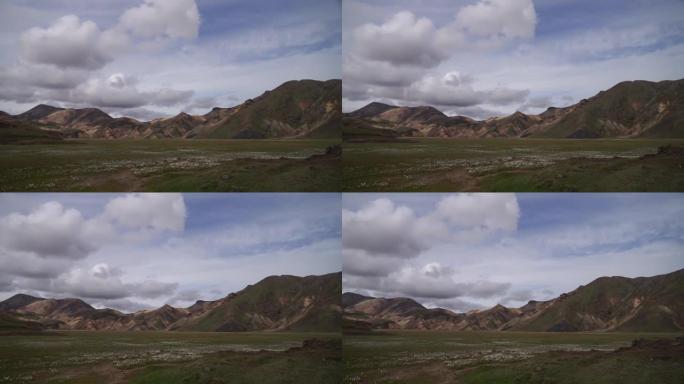 兰德曼纳劳加尔山谷。冰岛。劳加维古尔徒步旅行道上五颜六色的山脉。多色岩石，矿物，草和苔藓层的组合