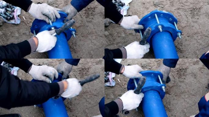 工人安装供水管道系统，关闭