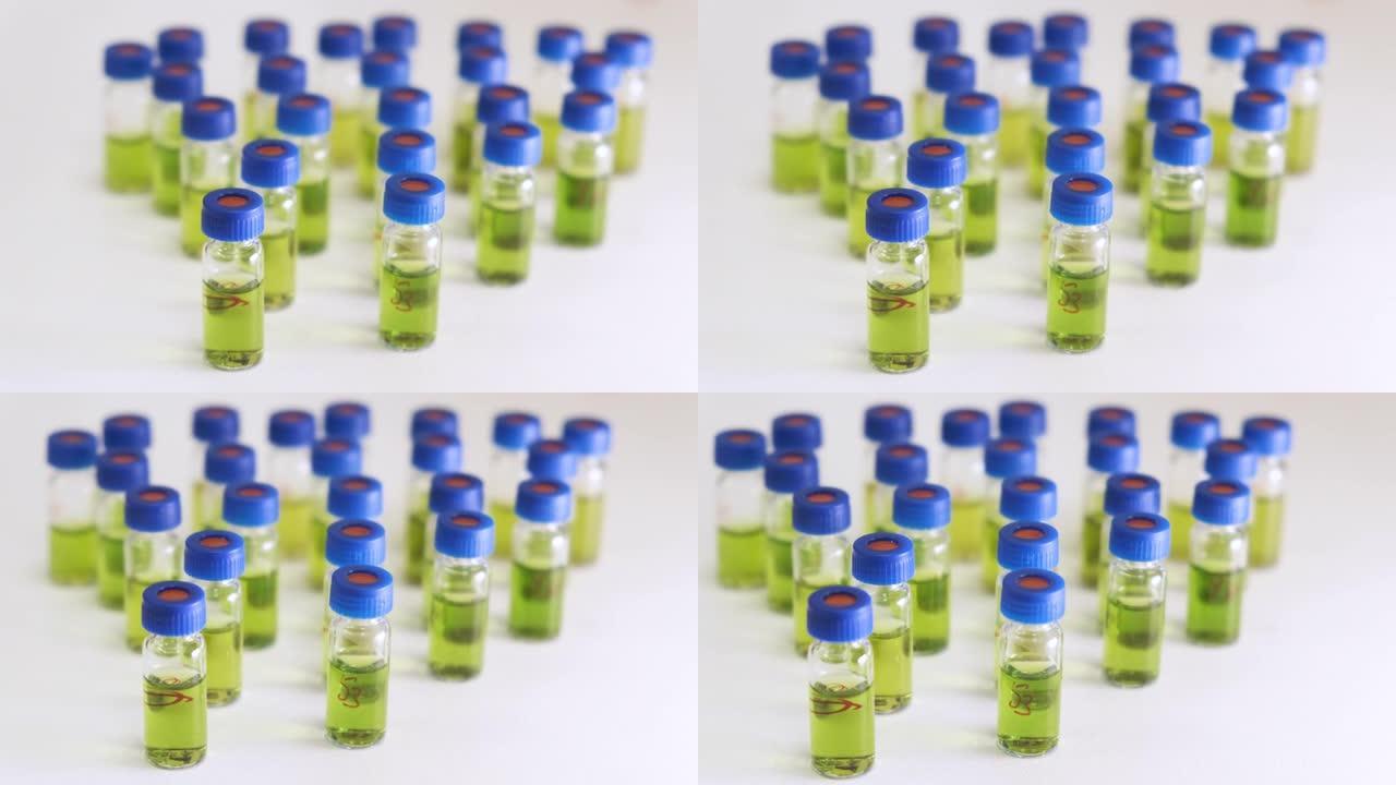 在HPLC分析之前，玻璃小瓶或带有绿色植物提取物的瓶子。代谢组学分析。