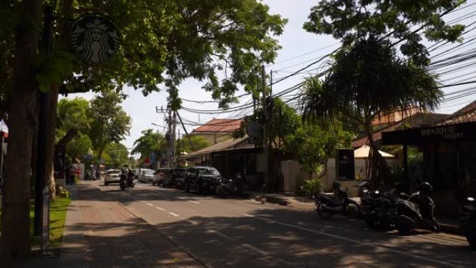 晴天巴厘岛交通街慢动作全景4k印度尼西亚