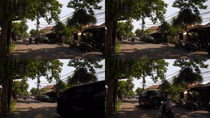 晴天巴厘岛交通街慢动作全景4k印度尼西亚