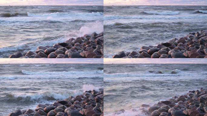 波涛汹涌的岩石海岸线在暴风雨中席卷而来。海浪用泡沫在石头上破裂。