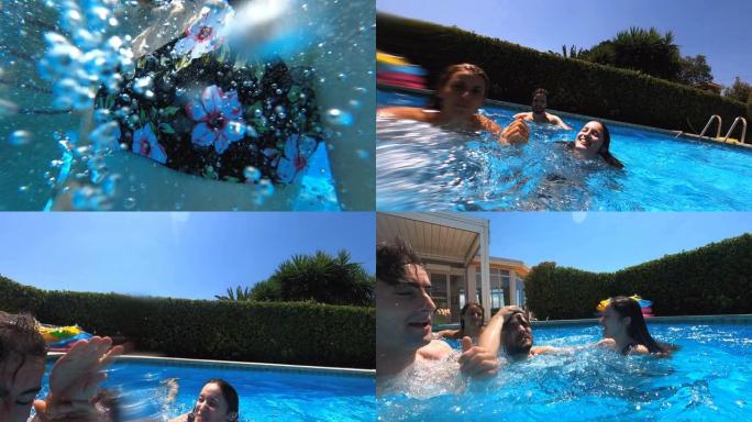 游泳池里的乐趣 -- 四个朋友在水下互相推