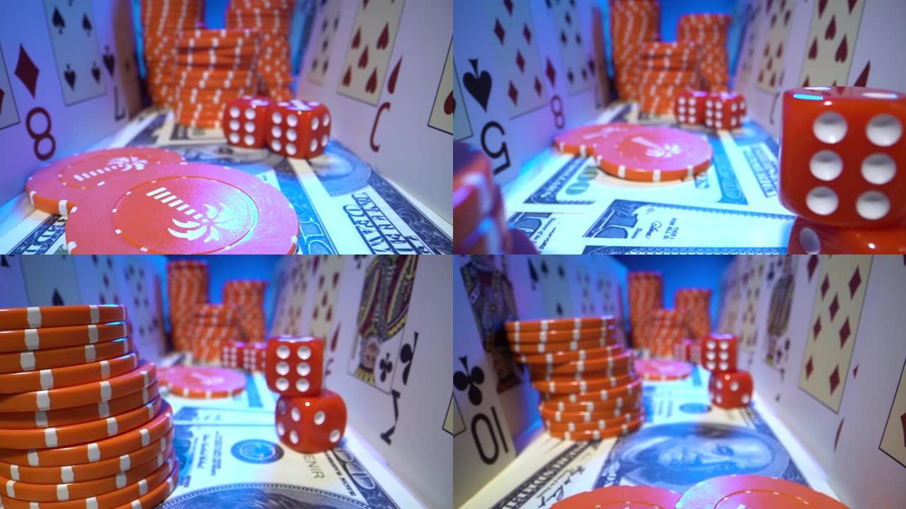 玩扑克的超级宏镜头。扑克牌，美元，筹码，红色骰子特写。垂直滑动摄像机