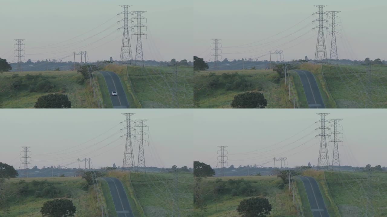 巴西圣保罗国际电联日落时分输电塔旁的道路