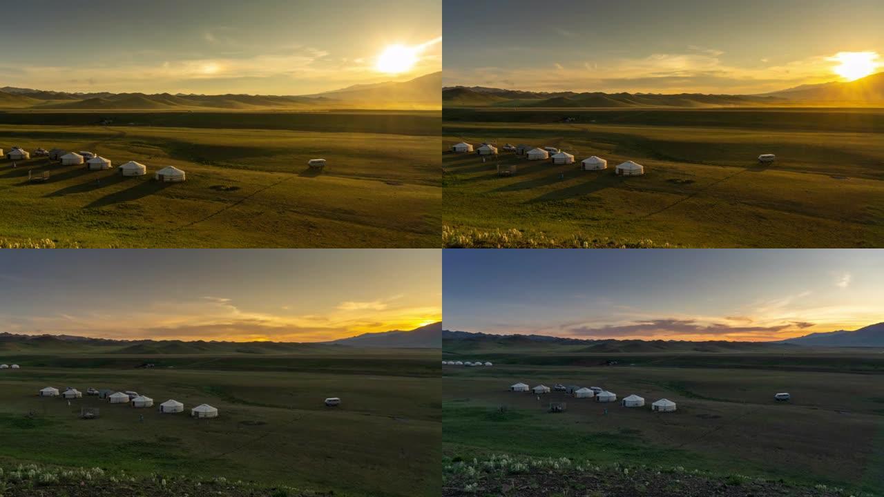 传统的蒙古包和日落的蒙古山