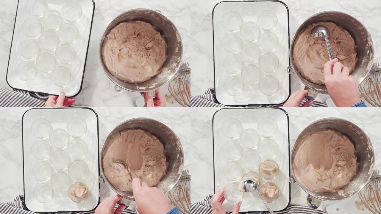 将自制巧克力冰淇淋舀入玻璃罐。