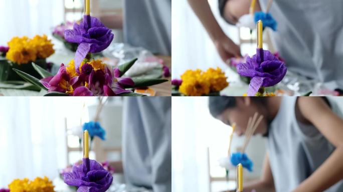 Kathong的鲜花布置 (由香蕉叶和漂浮在河中的花朵制成，用于祈祷和感谢) 在家里，为夜间做准备。
