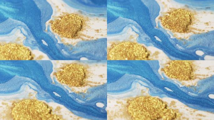 白色背景上的绿松石蓝色和金色。蓝金岛流系列。宏观抽象液体涂料视觉效果。VJ艺术背景。