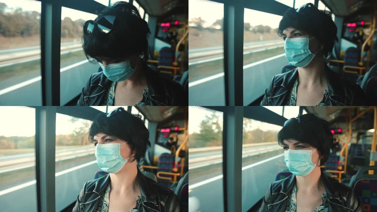 一个戴着面具的女人乘坐公共交通工具新型冠状病毒肺炎。