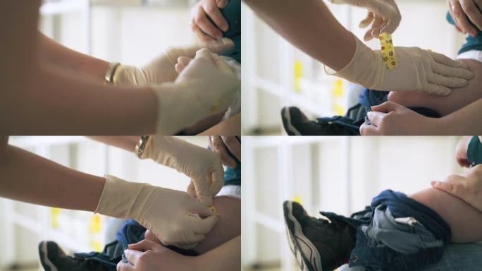 专业医生在婴儿腿上注射疫苗
