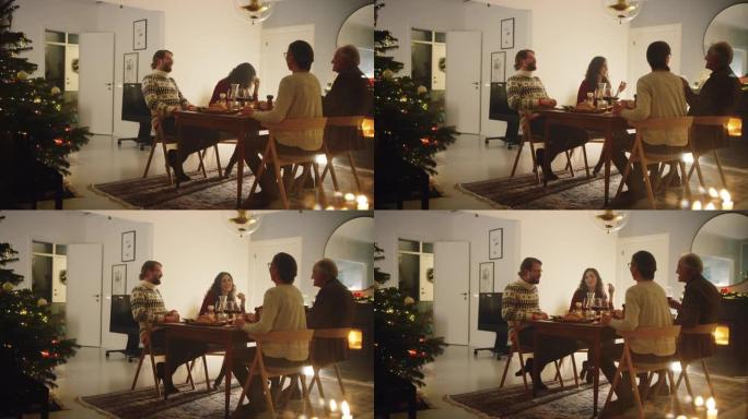 享受圣诞晚餐的家庭