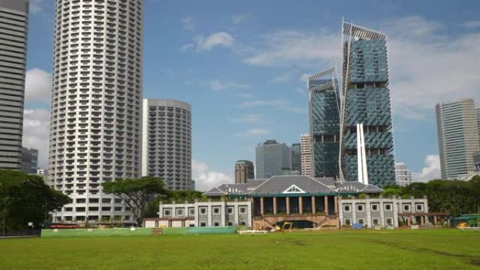 阳光灿烂的新加坡市中心著名的野外娱乐俱乐部现代建筑慢动作全景4k