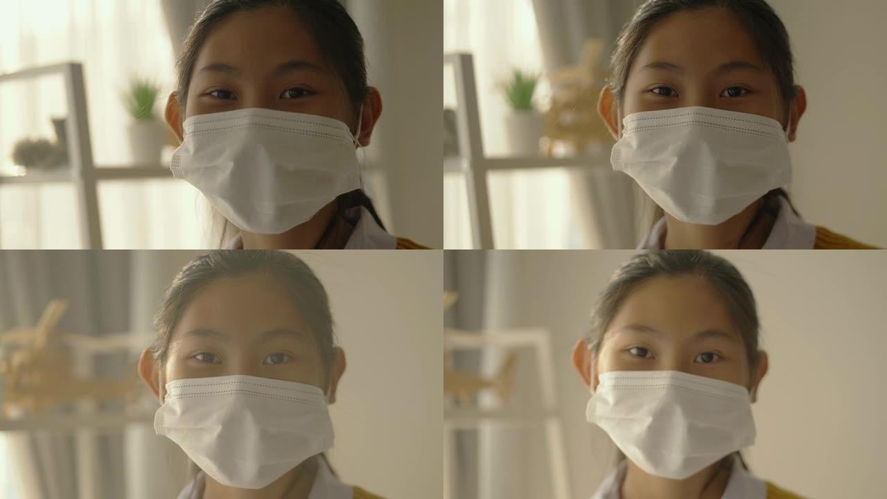快乐的亚洲女学生早上上学前戴着口罩，生活方式理念。
