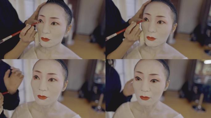 日本妇女为艺妓获得 “oshiroi' 特殊的白脸化妆