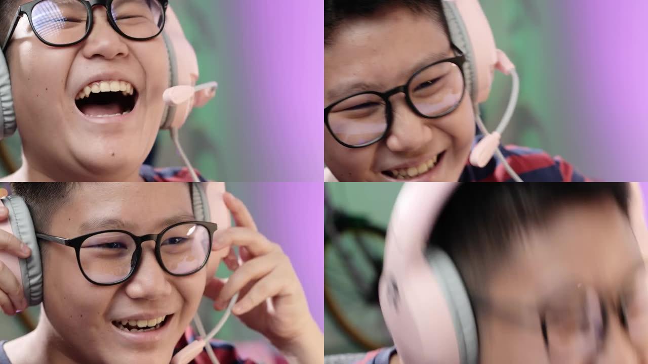 快乐的亚洲男孩赢得网络游戏，晚上在家中的电脑前跳舞，带led灯背景，生活理念。