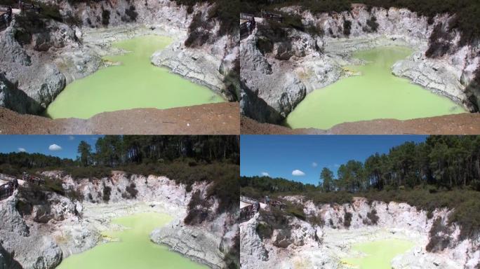 新西兰土壤背景上的间歇泉绿色温泉。
