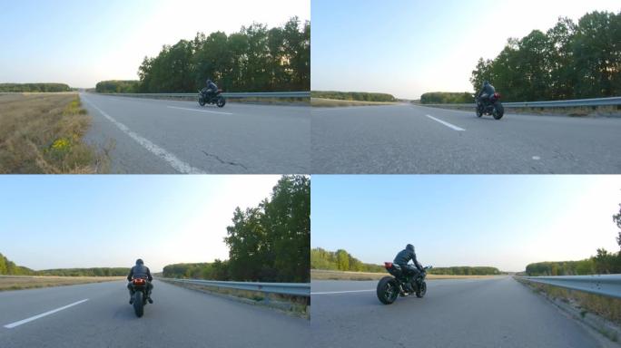 跟随戴头盔的摩托车手在高速公路上骑运动摩托车。男子在秋天的乡间小路上骑摩托车。旅途中开车的人。自由和