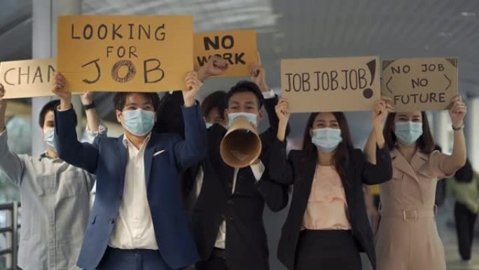 4k人戴着防护面具在城市街道上抗议