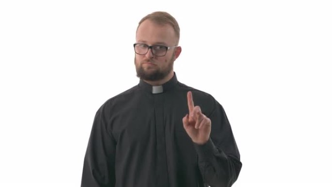 年轻的高加索牧师的肖像抬起食指，毫不示意地将食指从一侧移到另一侧，并摇了摇头。手指摇摆。孤立在白色背