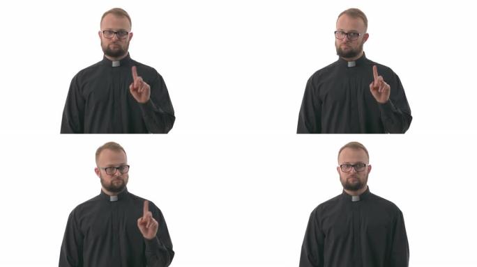年轻的高加索牧师的肖像抬起食指，毫不示意地将食指从一侧移到另一侧，并摇了摇头。手指摇摆。孤立在白色背