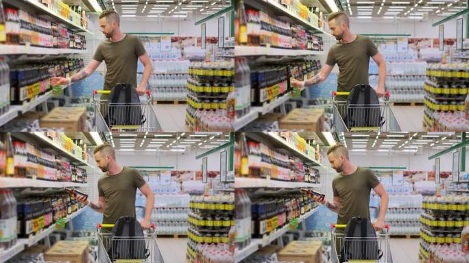 单身男子在超市购物，从货架上拿啤酒