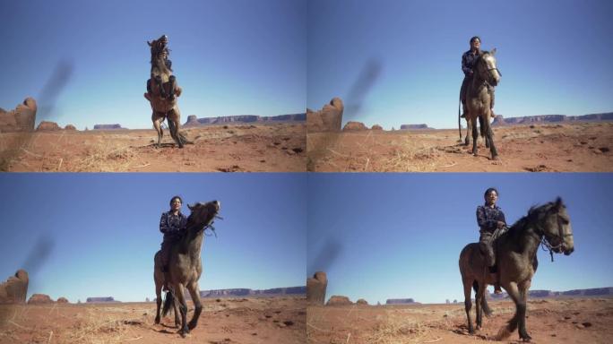 纳瓦霍少年在亚利桑那州纪念碑谷骑马