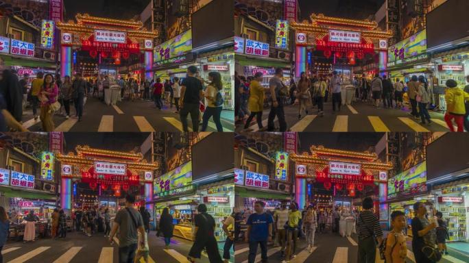 饶河夜市入口行人夜市霓虹灯人群