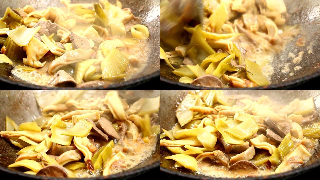 平底锅用猪肉胃油炸腌制生菜