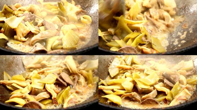 平底锅用猪肉胃油炸腌制生菜