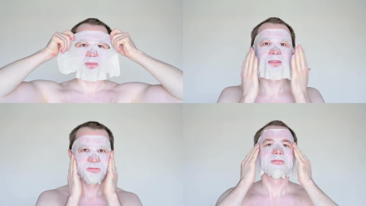 白人男子用化妆面具遮住脸。
