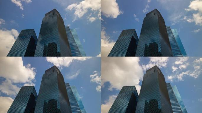 阳光灿烂的一天新加坡城市著名的市中心办公楼，全景延时4k