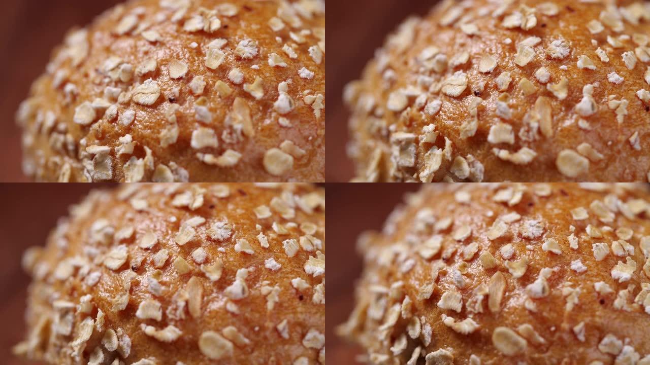 全麦面包的特写镜头以慢动作旋转。健康饮食的全麦面包