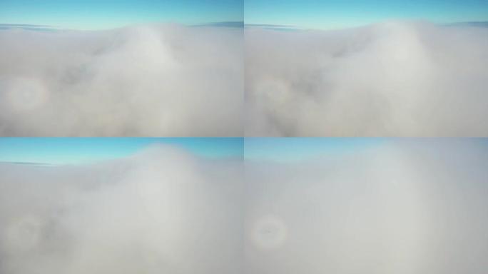 在云层上方飞行过程中四轴飞行器的航拍视频进入